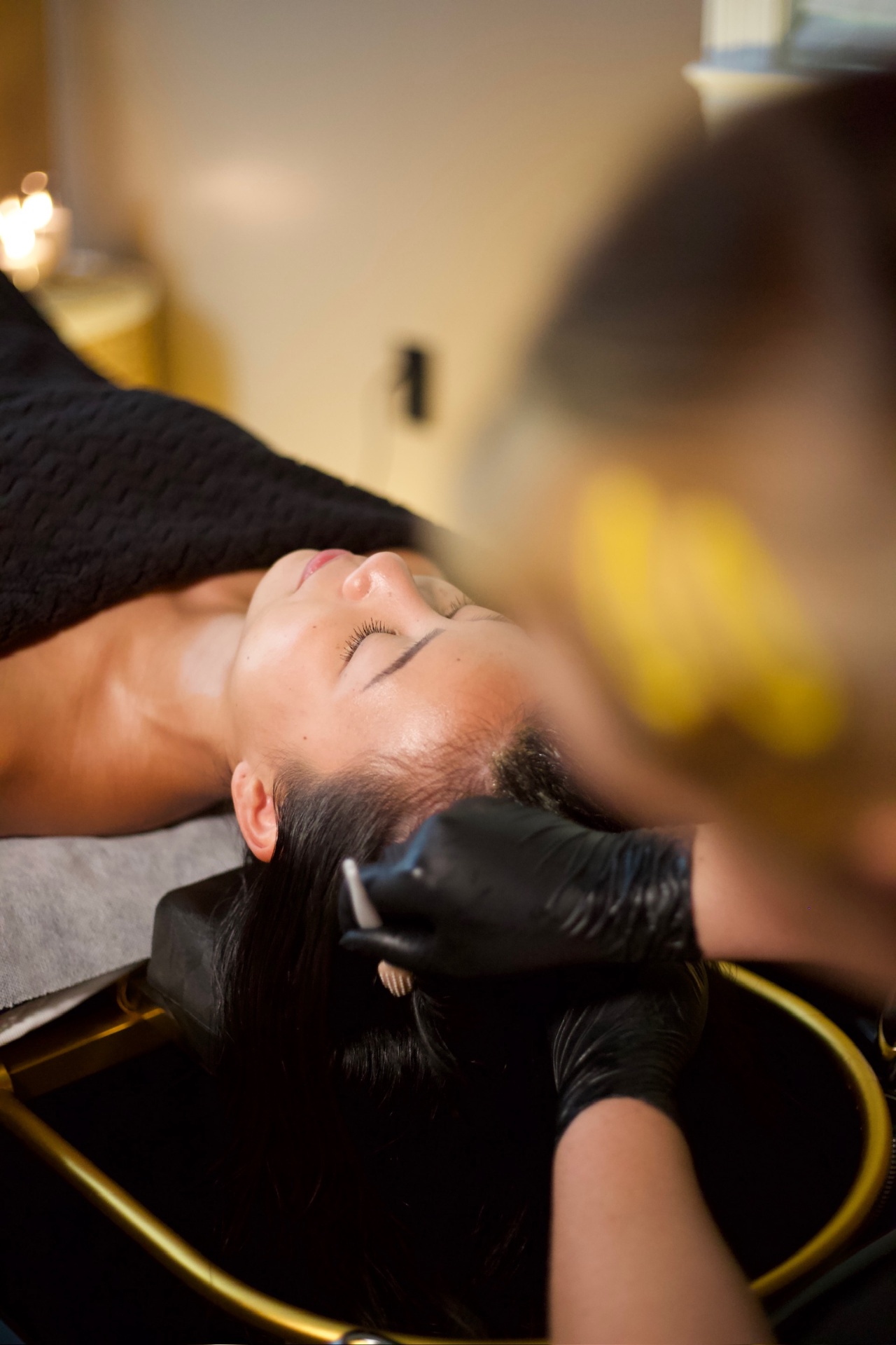 Guest relaxing during a SCaIR scalp treatment